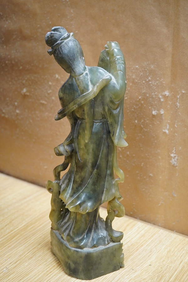 A Chinese carved green soapstone figure of Guanyin, 34cm high. Condition - fair to good